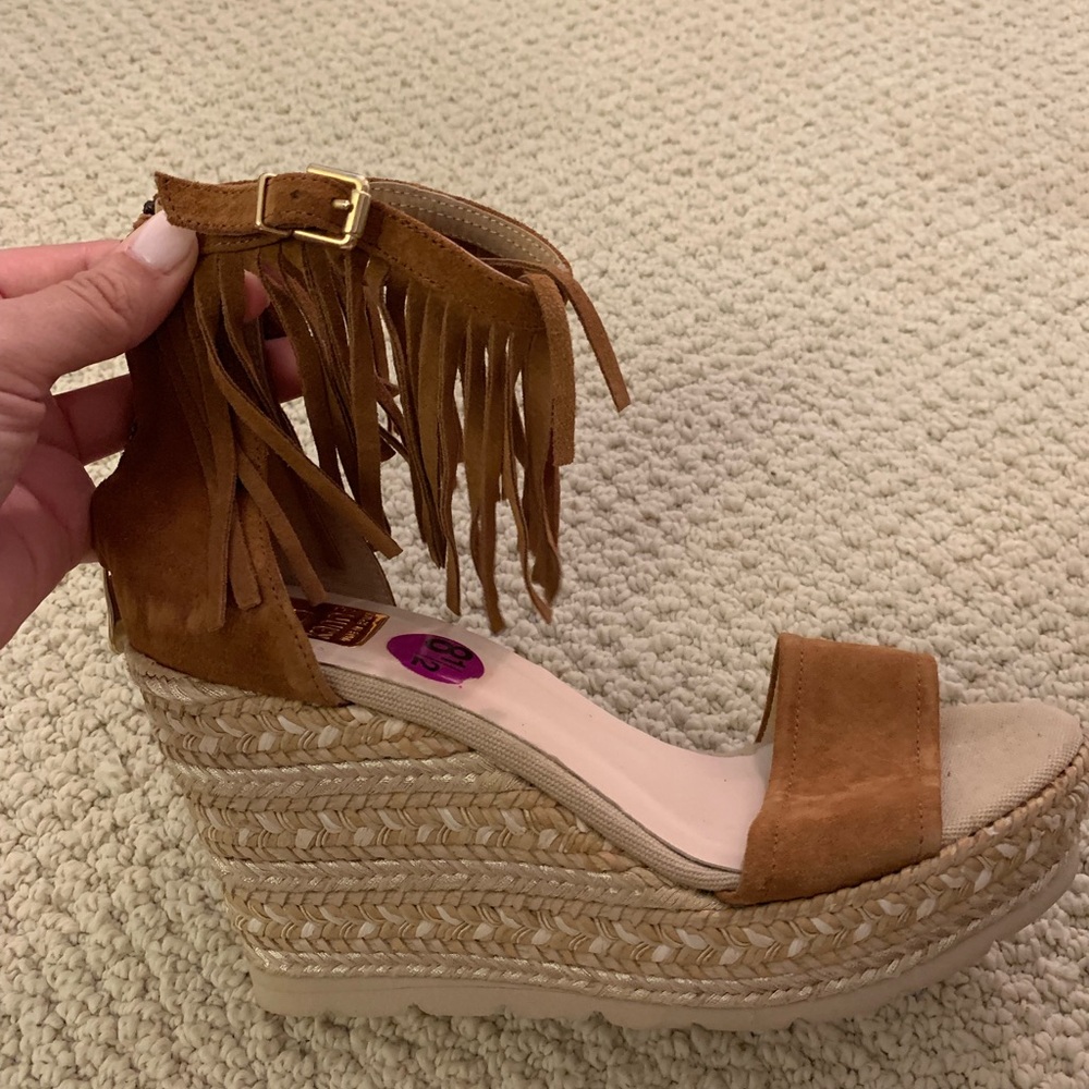 Brown tassel wedges